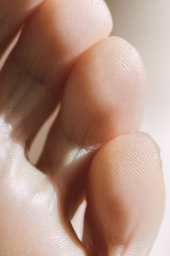 Detailed close-up of human toes showcasing skin texture and structure.